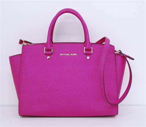 michael kors bright pink handbags|michael kors pink suitcase.